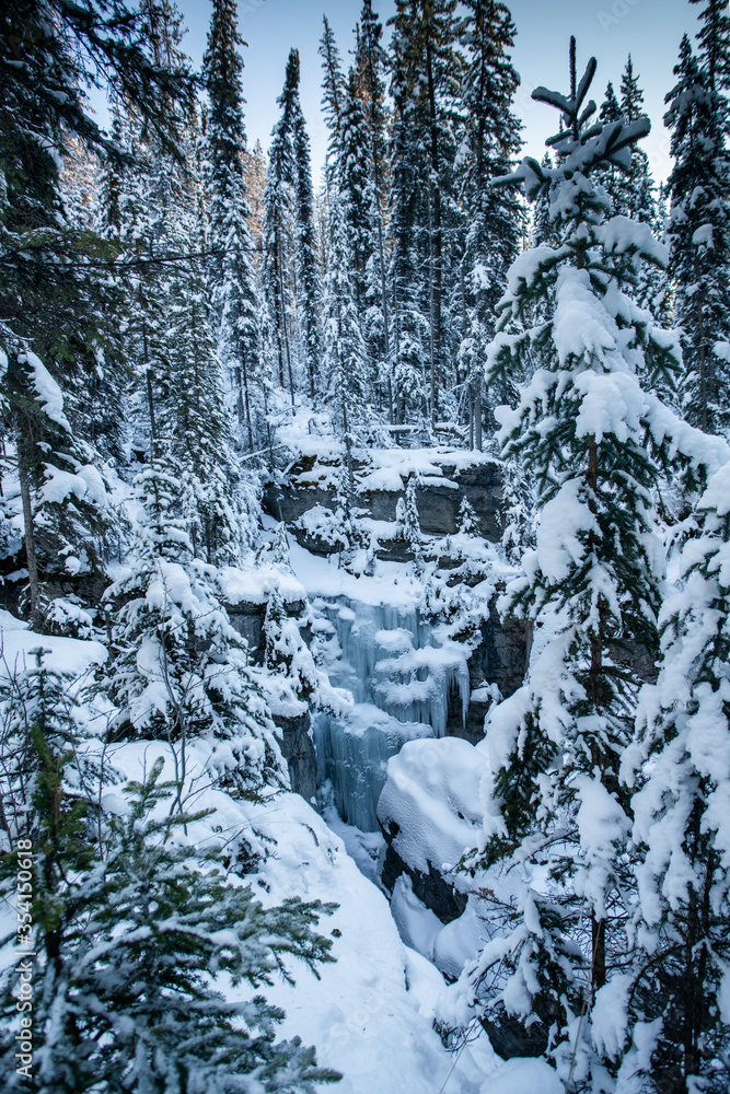 Maligne canyon covered in snow and ice in the winter in alberta