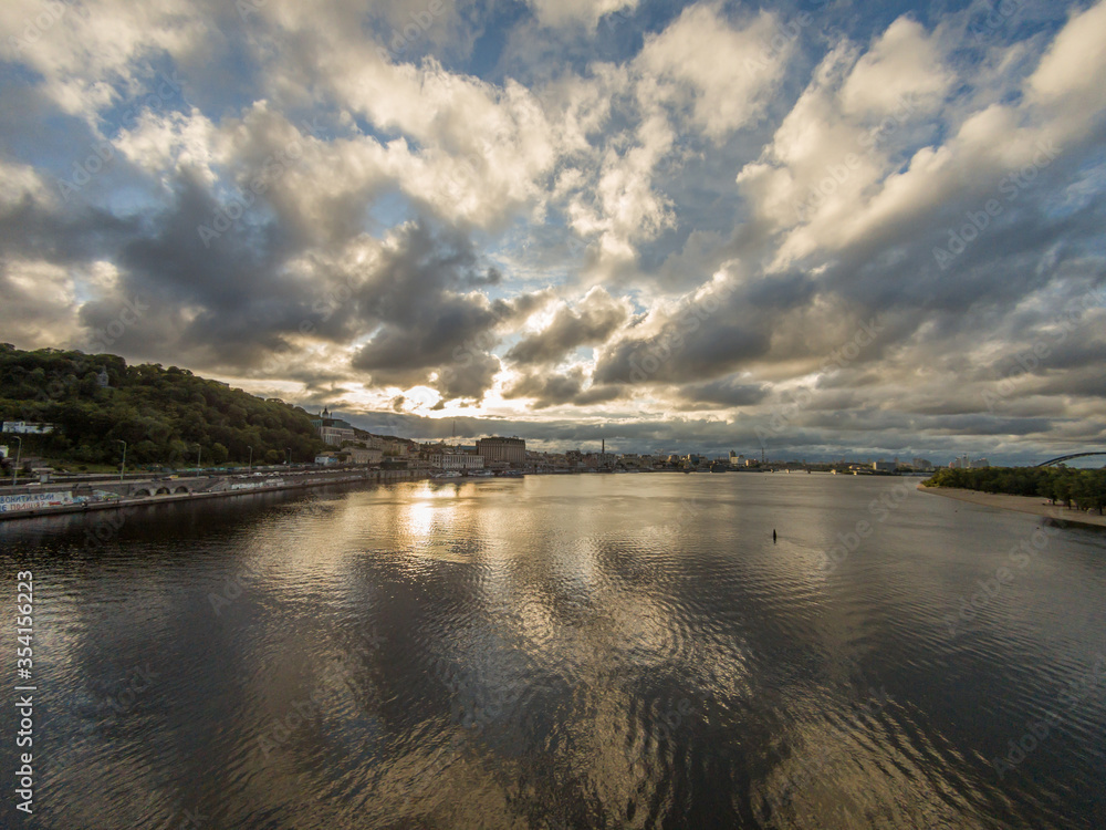 Fototapeta premium Kyiv (Kiev), Ukraine - May 30, 2020: A gorgeous sunset on a famous river Dnipro (Dnepr)