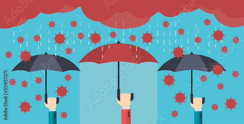 businessman's hand with umbrella protects against coronavirus