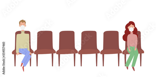 Two people sitting distance apart on row of chairs
