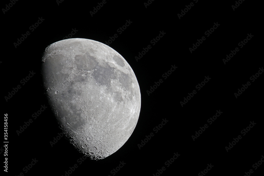 Waxing Gibbous lunar phase as seen from the Northern Hemisphere witht the moon set against a clear black night sky Waxing Gibbous lunar phase as seen from the Northern Hemisphere witht the moon set against a clear black night sky