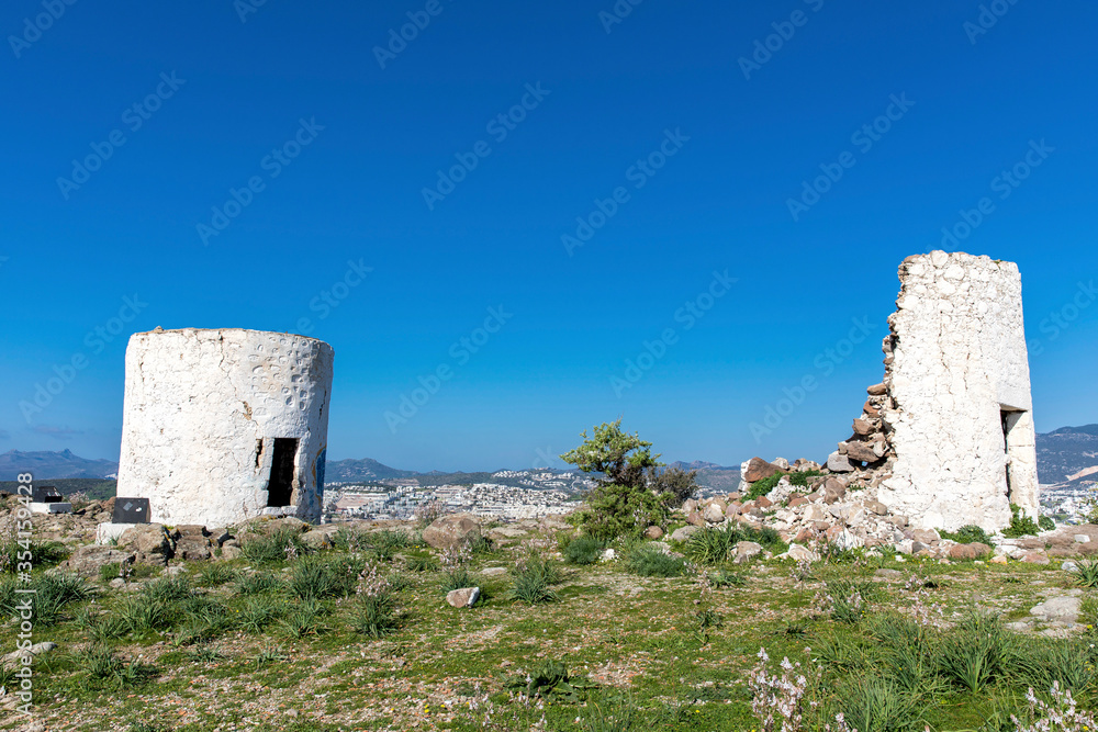 old windmills located in the bodrum of the high hill in Turkey.