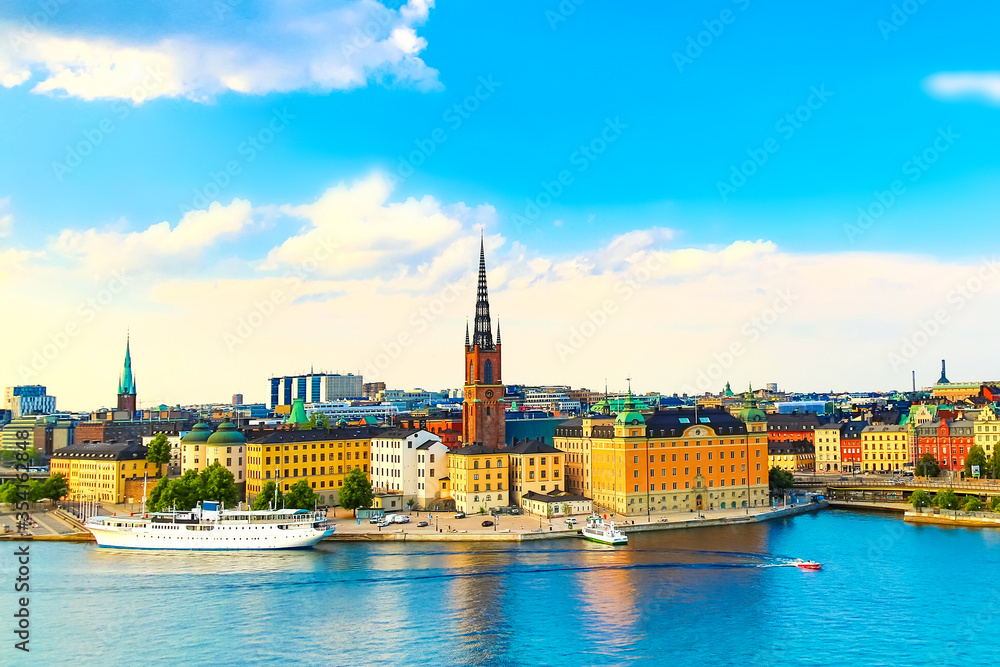 Beautiful panoramic view of Stockholm Old town Gamla Stan with a cruise ship. Summer sunny day in Stockholm, Sweden.