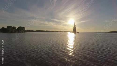 KALYAZIN, RUSSIA-15/08/2019: Fly over the water near the flooded bell tower in the middle of the Volga river in the city of Kalyazin