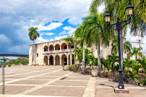 View of Alcazar de Colon Diego Columbus Residence from Spanish Square with blue sky. Famous colonial landmark in Dominican Republic photo