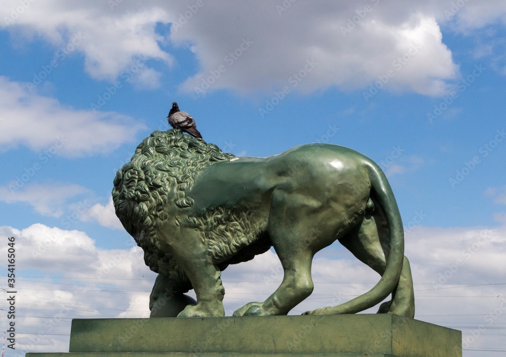 Sculpture of a lion on the waterfront