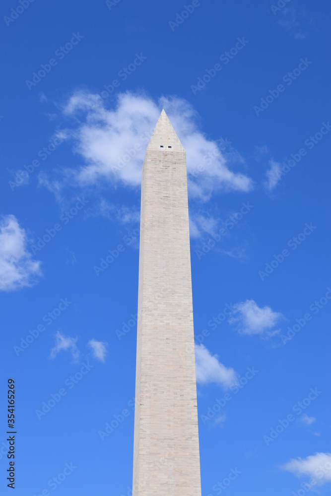 The Washington Monument on a bright cloudy day
