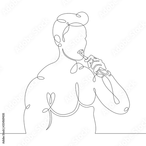 young man brushes his teeth early in the morning