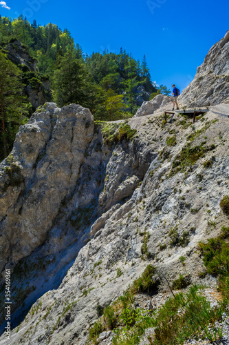 Young Man Walks On Rocky Hiking Trail In Ötschergräben In Austria