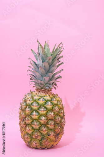 Close up one pineapple isolated on pastel background.