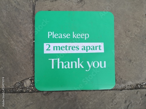 Please keep 2 metres apart sign