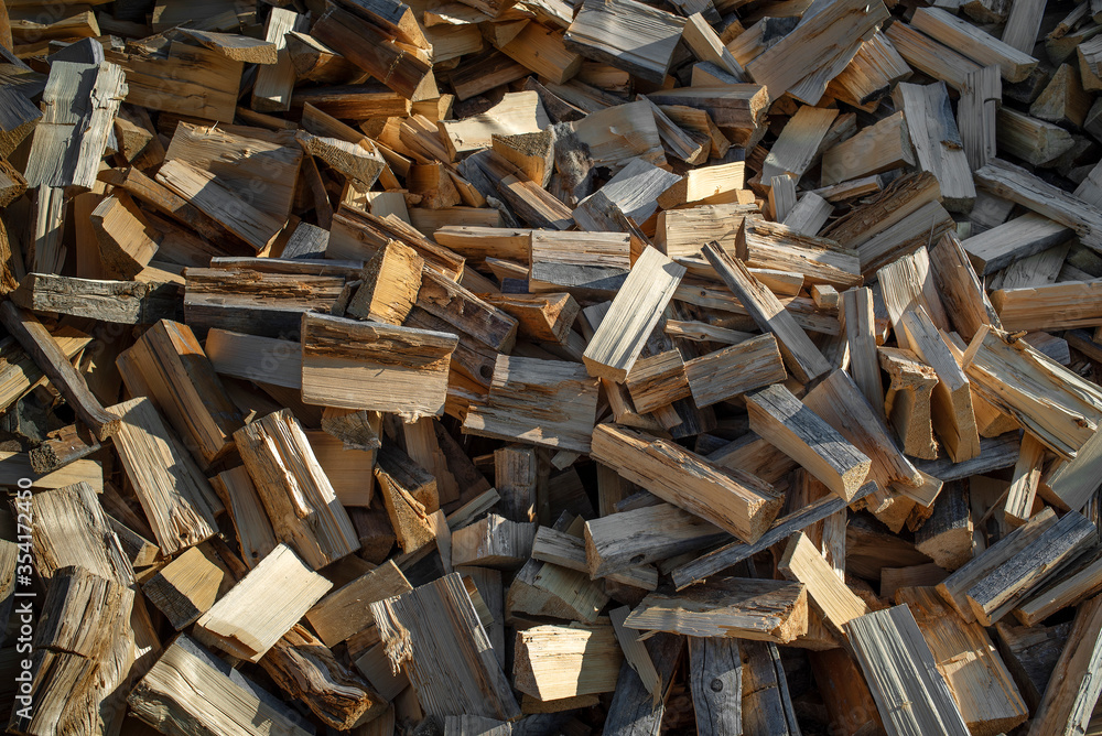 A scattering of firewood. Background image A scattering of firewood. Background image