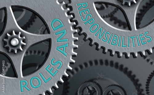 Writing note showing Roles And Responsibilities. Business concept for Business functions and professional duties