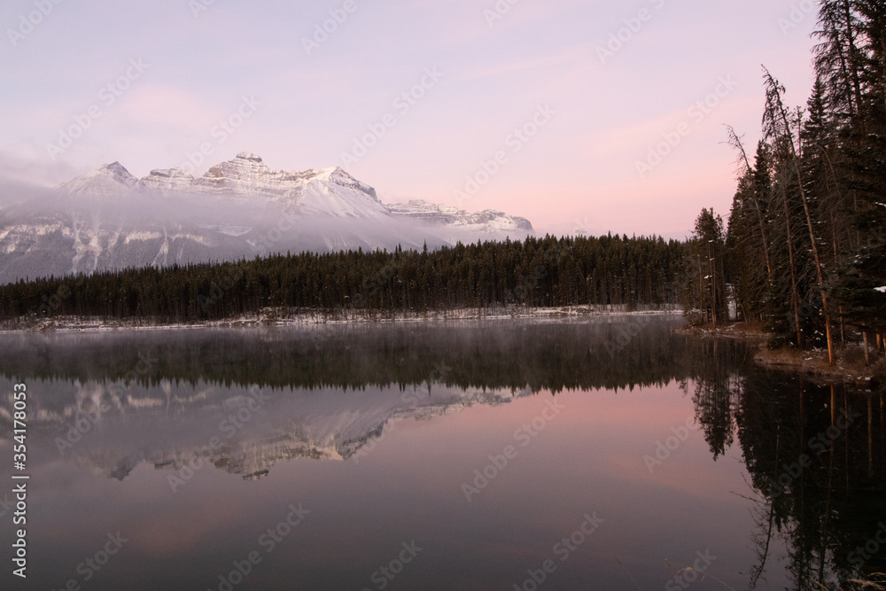 Pink Skies Over the Still Mountain Lake