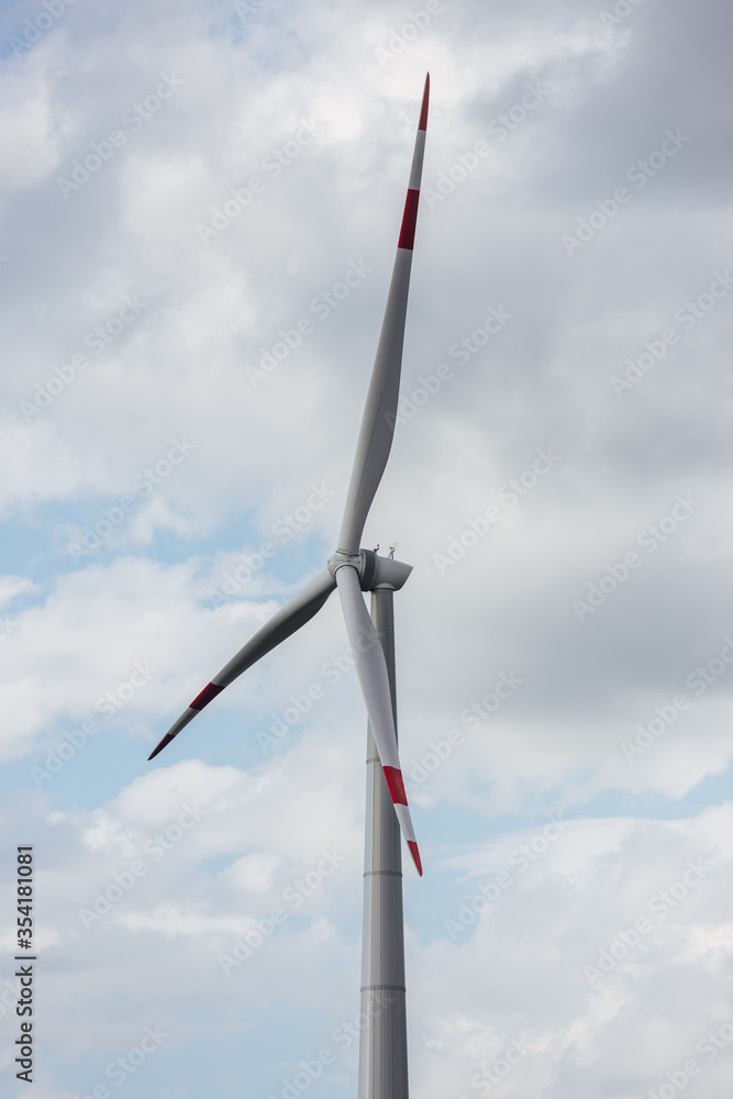 windmill against a cloudy sky