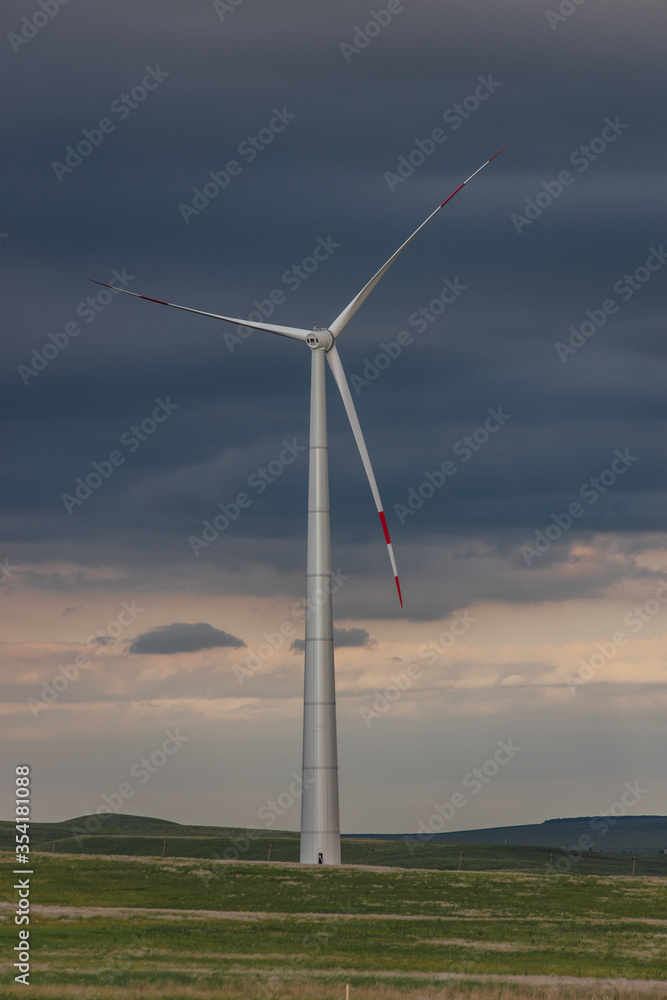 windmill against a cloudy sky windmill against a cloudy sky