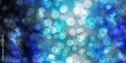 Light BLUE vector layout with circle shapes. Illustration with set of shining colorful abstract spheres. Design for your commercials.