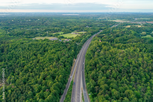 Slika na platnu Motorway sceen goes through countryy side green