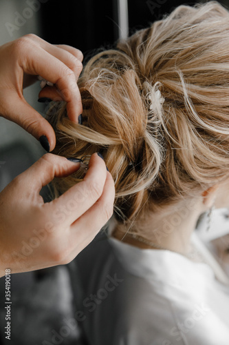hair, woman, beauty, beautiful, blond, young, hairdresser, portrait, hairstyle, blonde, head, salon, fashion, model, white, long, face, care, one, person, wedding, style, hands, hand, closeup