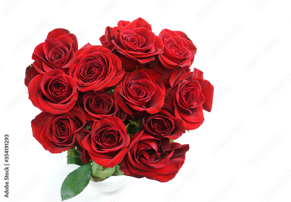 fresh red roses in a bouquet isolated on white background fresh red roses in a bouquet isolated on white background