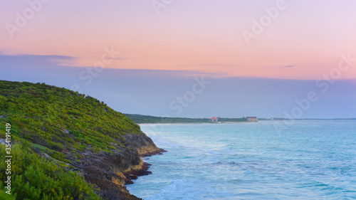 Dawn on the Caribbean Sea. Clear sky with small clouds.