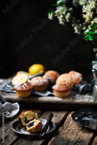 lemon blueberry muffins.dark photo..style rustic