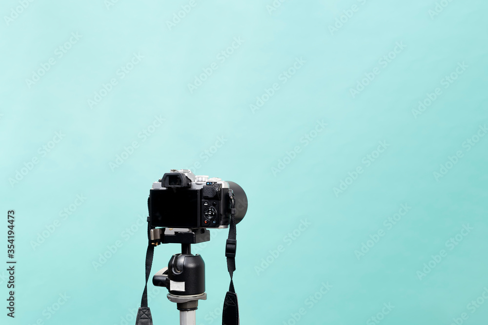 mirrorless digital camera on a tripod mirrorless digital camera on a tripod