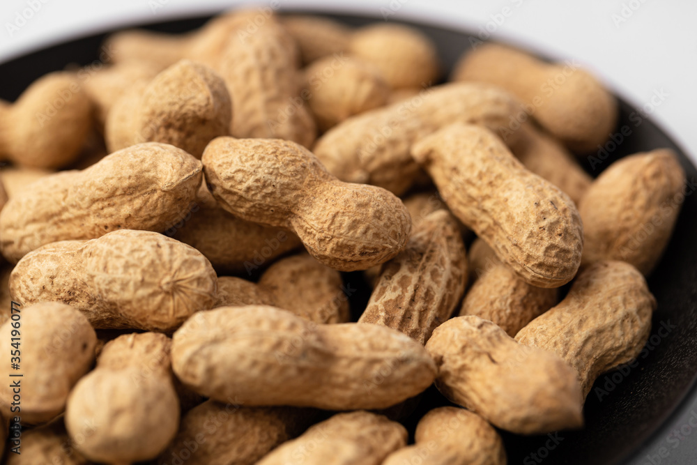 peanut in a shell texture on white background.