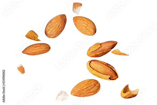 almond pieces Broken shell nut Flying with nut clipping path on white isolated . image stack High resolution image