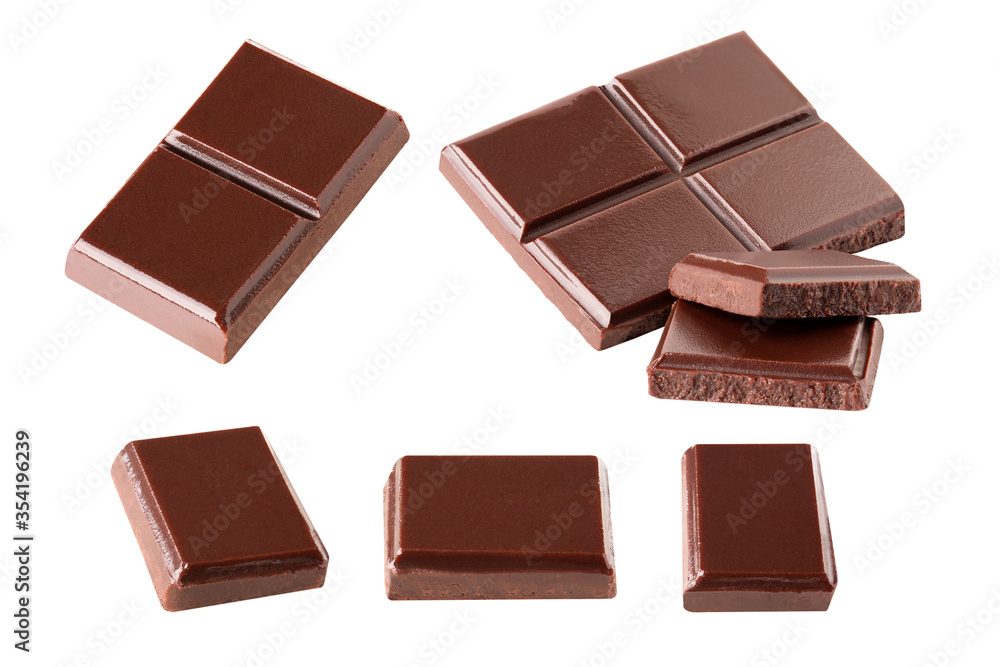 chocolate flying pieces in the air on a white background collection .Clipping path. chocolate flying pieces in the air on a white background collection .Clipping path.