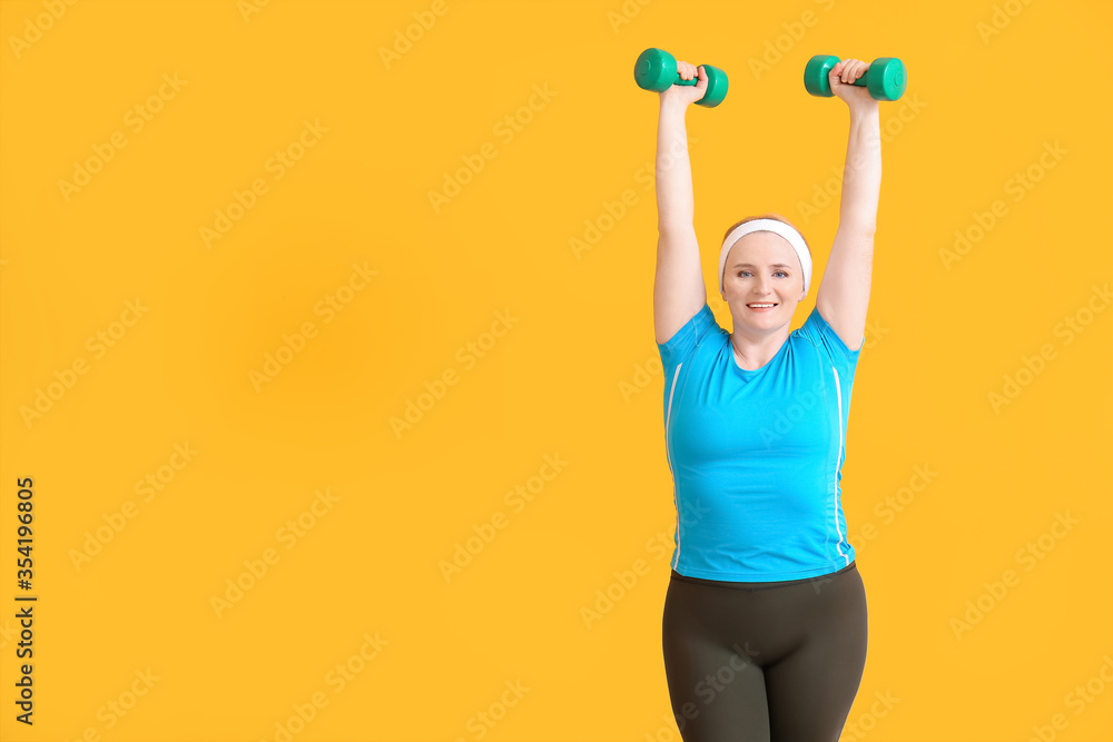 Woman with excess weight training on color background Woman with excess weight training on color background