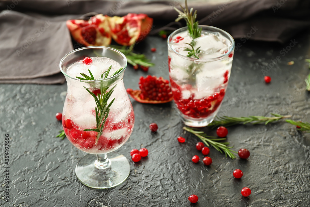 Glasses of healthy cocktail on dark background Glasses of healthy cocktail on dark background