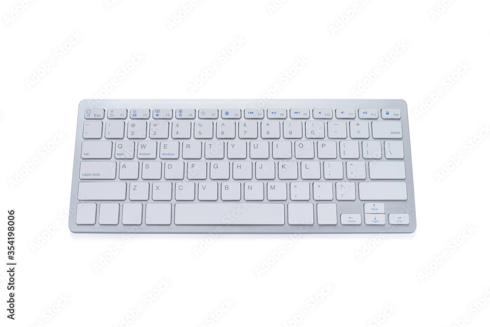 Top view of Modern computer keyboard isolated on white background with clipping path. material made from aluminum and plastic. It is electronic device used for business and internet communication. Top view of Modern computer keyboard isolated on white background with clipping path. material made from aluminum and plastic. It is electronic device used for business and internet communication.