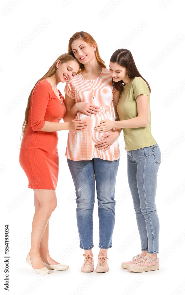 Lesbian couple and pregnant woman on white background. Surrogate motherhood concept Lesbian couple and pregnant woman on white background. Surrogate motherhood concept