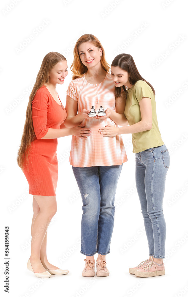 Lesbian couple and pregnant woman on white background. Surrogate motherhood concept