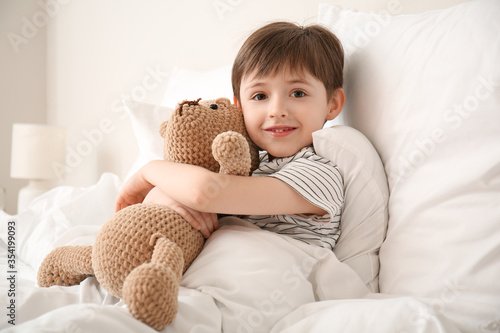 Morning of little boy in be...