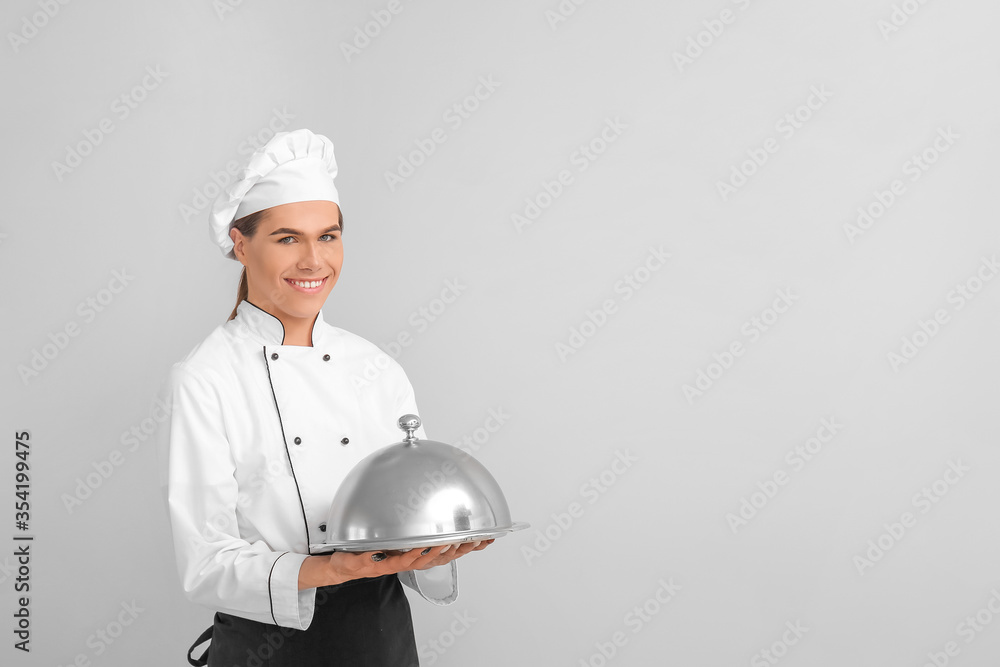 Transgender chef on light background Transgender chef on light background