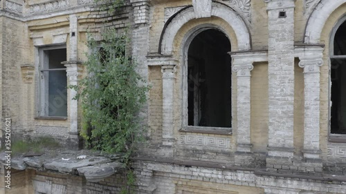 Wallpaper Mural Abandoned old apartment building with broken windows. Deserted 19th century house for demolition.  Close-up shot. Aerial view Torontodigital.ca