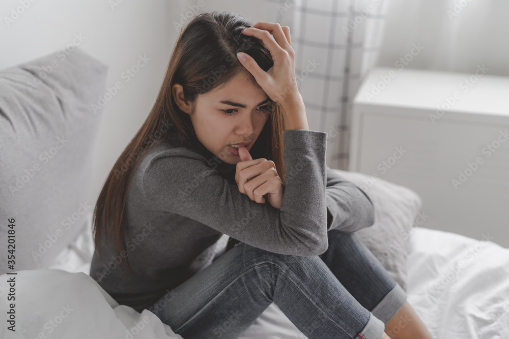 asian young teenager sit on bed feel depressed mental health problem asian young teenager sit on bed feel depressed mental health problem