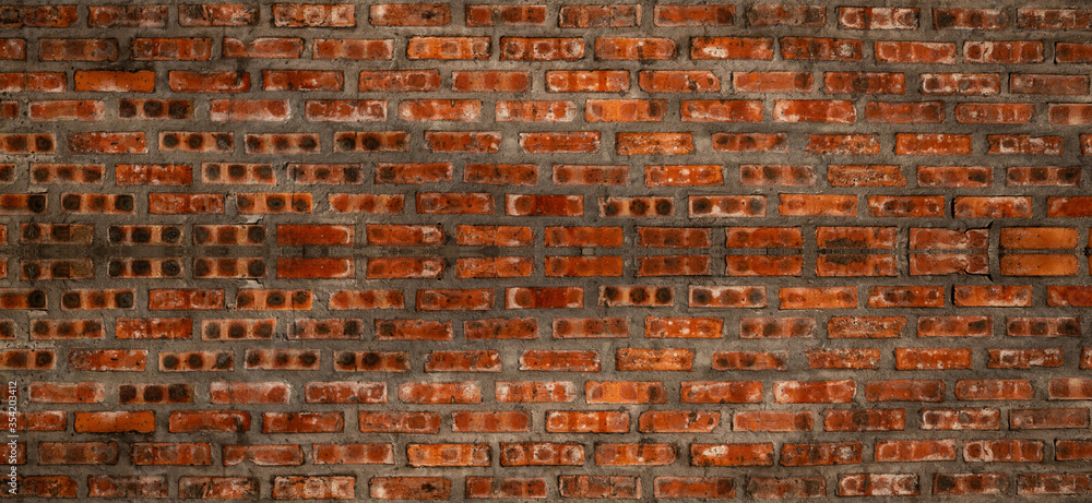 Naklejka premium Orange brick wall texture background