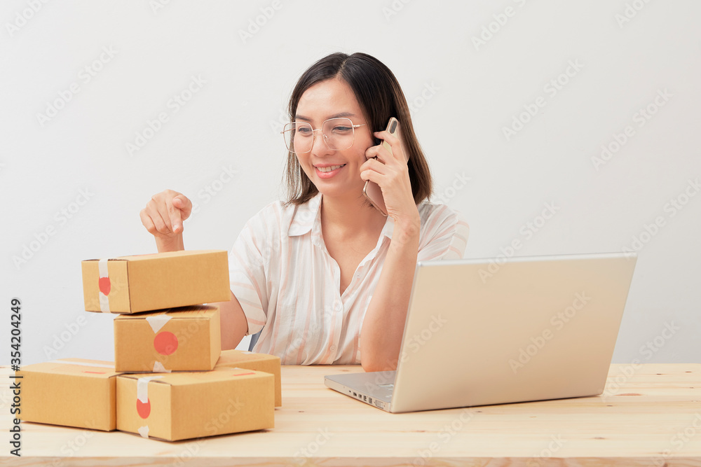 Young asian own bussiness at home office Young asian own bussiness at home office