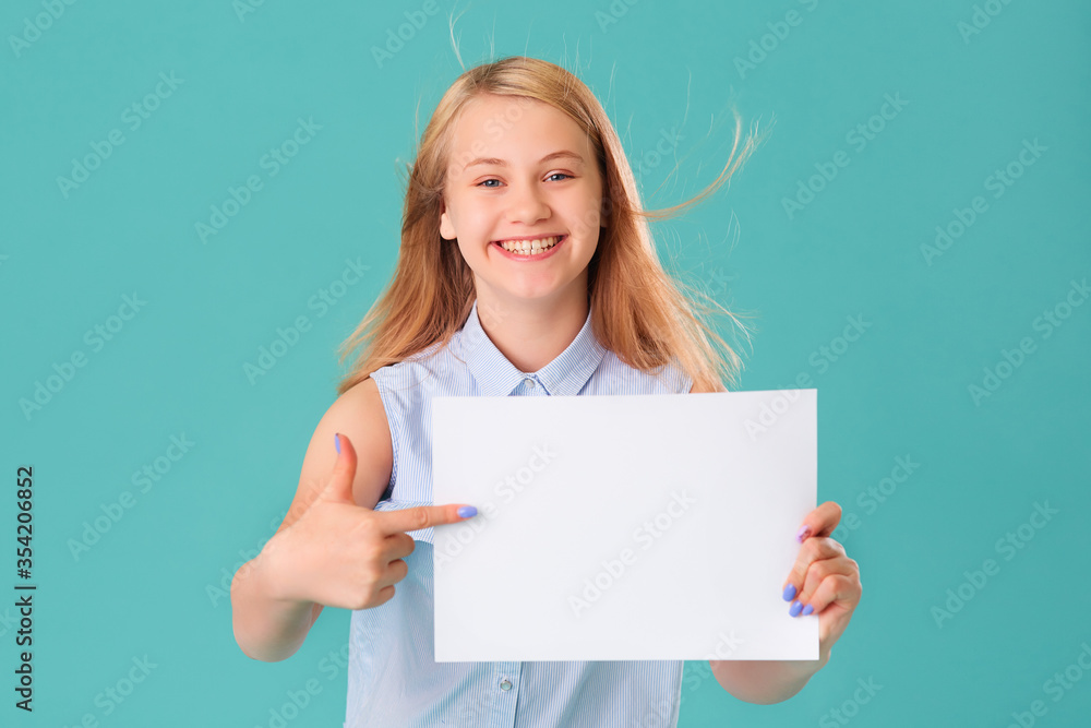 Caucasian teen girl holding a white Board Caucasian teen girl holding a white Board