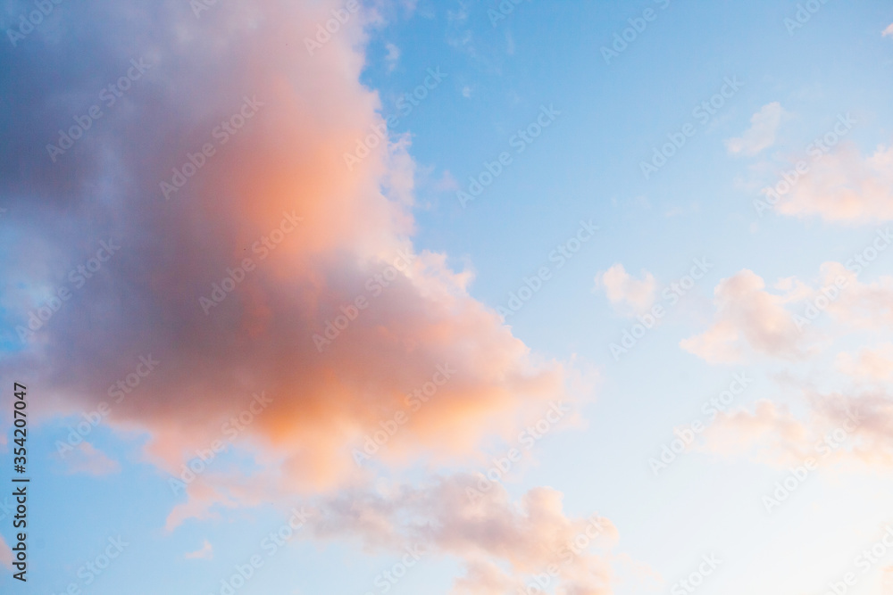Blue sky, pink clouds, sunset.