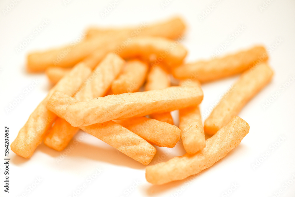 prawn crackers stick isolated on white background - homemade crunchy prawn crackers or shrimp crisp traditional snack prawn crackers stick isolated on white background - homemade crunchy prawn crackers or shrimp crisp traditional snack