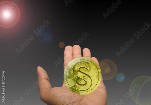3d gold coin in hand on black background with light 3d rendering