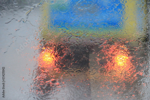 Fototapeta Naklejka Na Ścianę i Meble -  auto rickshaw in rain