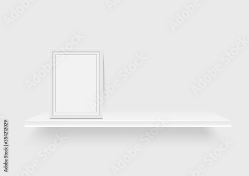picture frame and white shelf