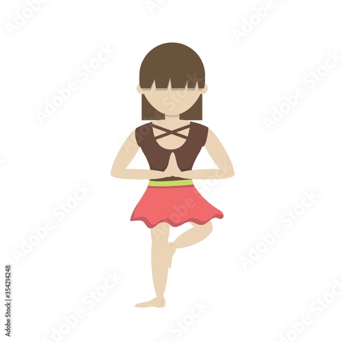 Girl practicing yoga in tree pose