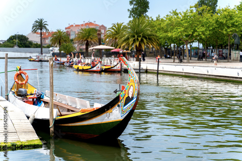 Moliceiro boats docked along the central canal in Aveiro, called Portugal Venice