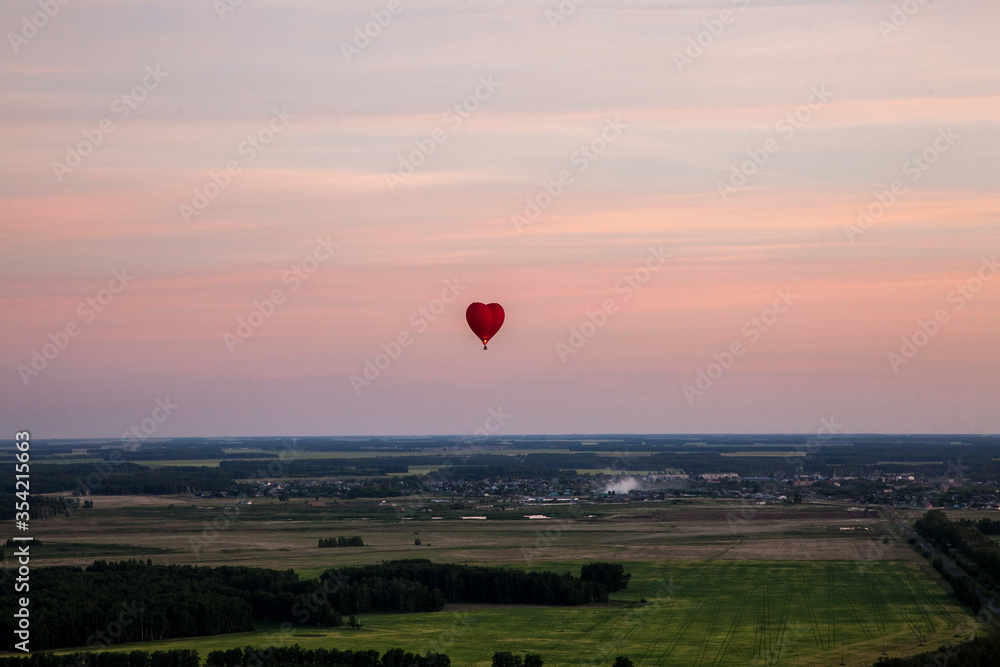 Beautiful bird's-eye views are breathtaking. Hot air balloon flight above the clouds. Unforgettable journey.
